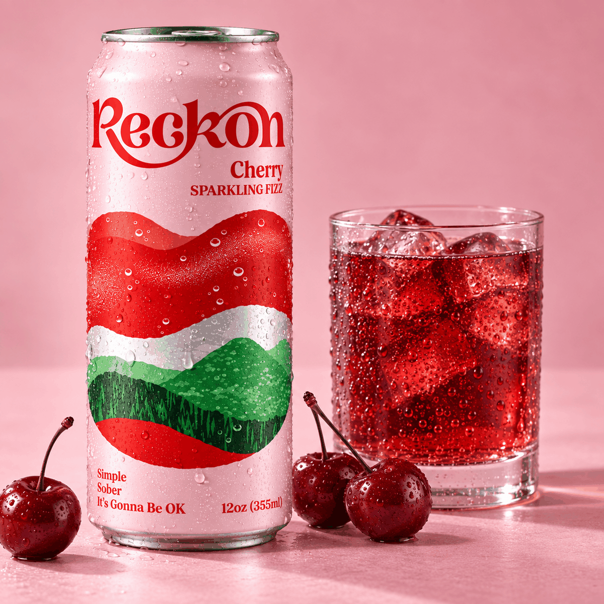 Reckon Cherry can beside a poured glass over ice with fresh cherries